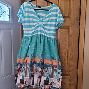 Aqua striped short-sleeve midi dress with NYC skyline skirt, good condition